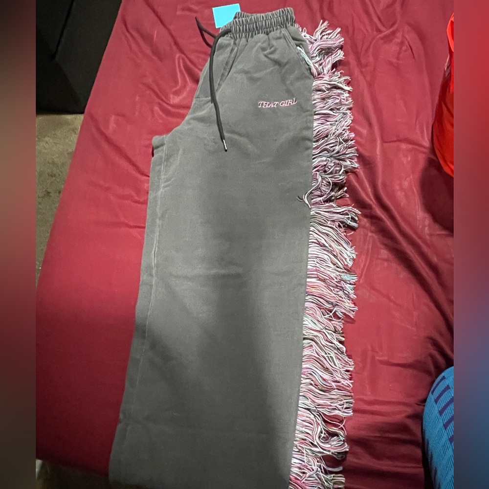 Fringe sweatpants size small but runs BIG